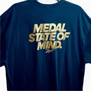 NWT Reebok Navy Blue Tee Metallic Gold Graphic 100% Cotton Medal State of Mind